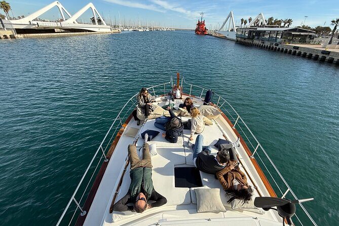 Chill and Sail in Valencia - The anchor stop: mats in the bow, sheltered water, and a real swim break
