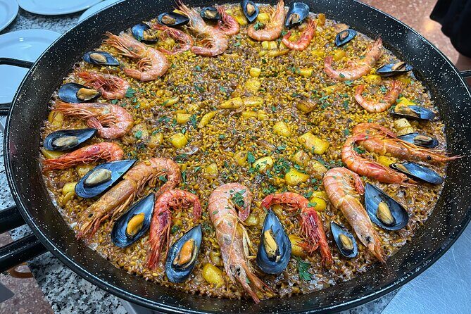 Seafood paella cooking class, tapas and visit to Ruzafa market. - Price and value: is $78.64 per person a fair deal?