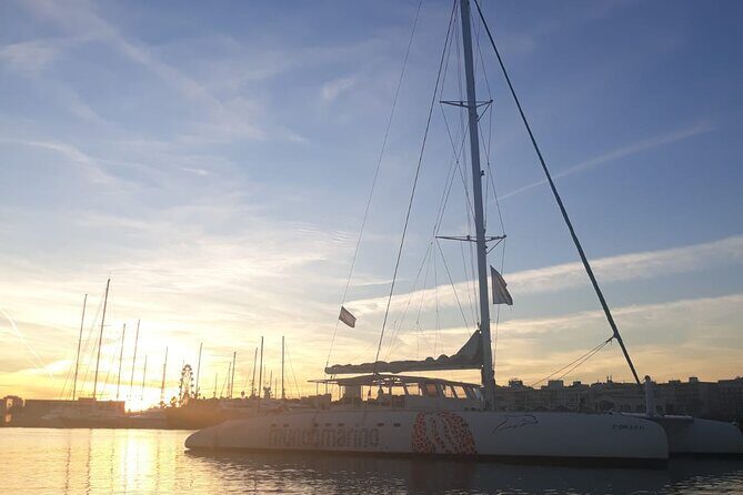 Sunset in Valencia from the Catamaran Mundo Marino - Valencia sunset views from Malvarrosa, not a long sightseeing bus