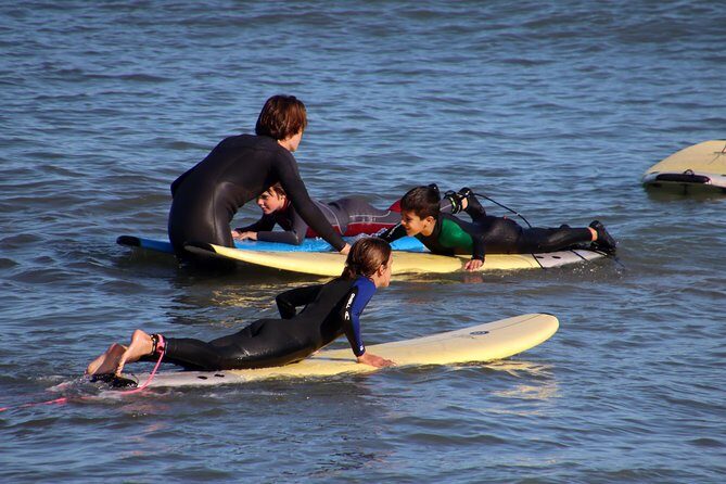 Surf lesson on Valencia beach - The beach coaching that helps you stand up faster