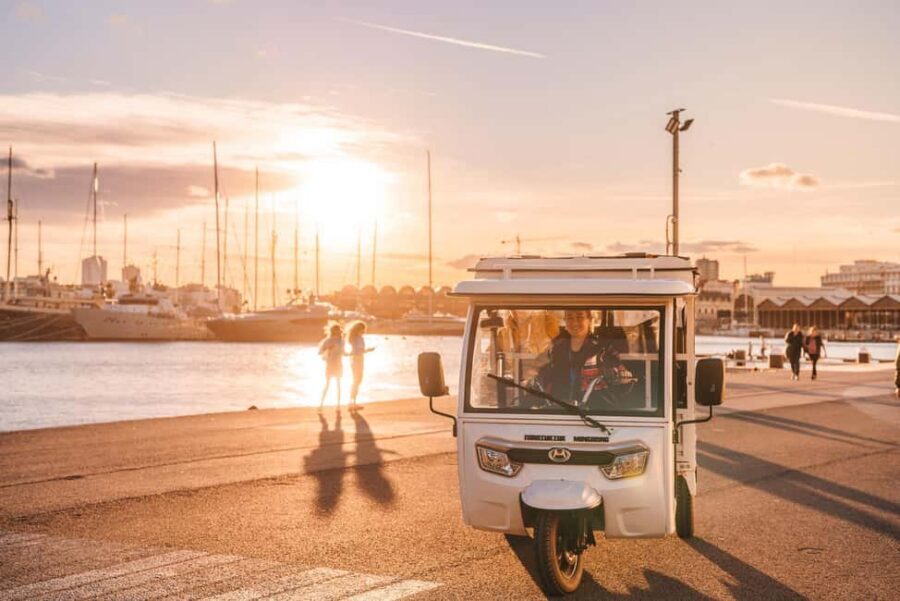 Valencia: 2-hour City Highlights Guided Tuk-Tuk Tour - Malvarrosa Beach and Platja de Llevant: sea air plus photo opportunities