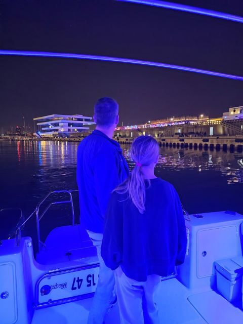 Valencia: Night Cruise with Free Drink - Veles e Vents, Tinglados, and the Clock Building: Why the Sights Look Better at Night