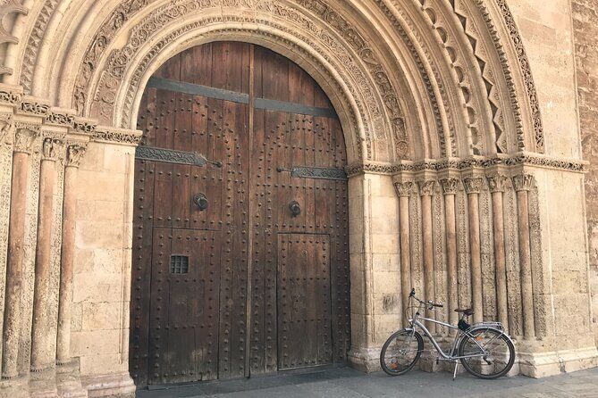 Valencia Old Town Private Tour by Bike or Electric Ride - Stop 3 and 4: Valencia Cathedral area, facades and the Miguelete viewpoint