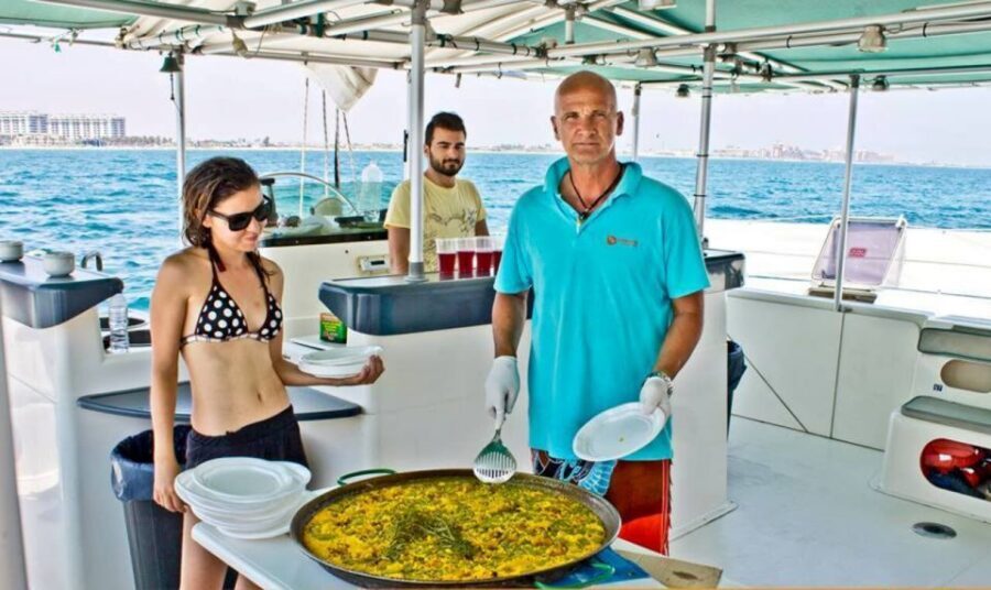 Valencia: Sailing Catamaran Cruise with Valencian Lunch - The swim stop: anchor near shore for a calmer sea moment