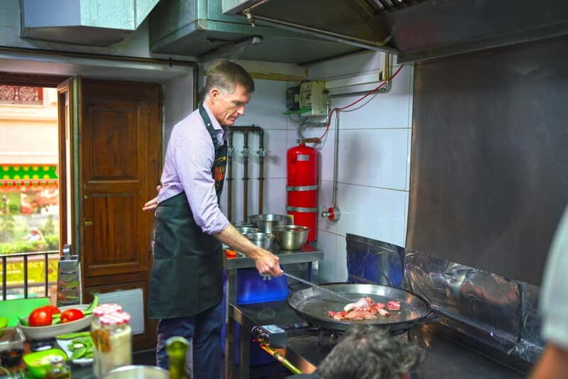 Valencia: Traditional Paella Cooking Class and Dinner - Tapas, Sangria, and Snacks While Your Paella Cooks