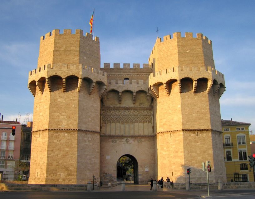 Valencia: Walking Tour of the Medieval City Center - Torres de Serranos: A City Gate Built to Impress and Defend