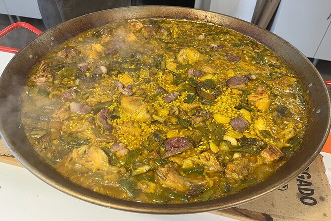 Valencian Paella class with welcome drinks and tapas - Welcome drinks, tapas, and the Valencian start
