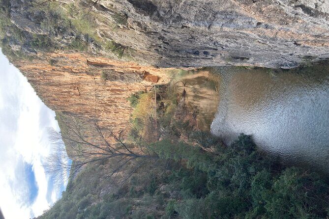 Walking Tour of the Hanging Bridges of Canyon de Turia and Chulilla Village - Dry riverbed climb and the ridge reveal toward Chulilla